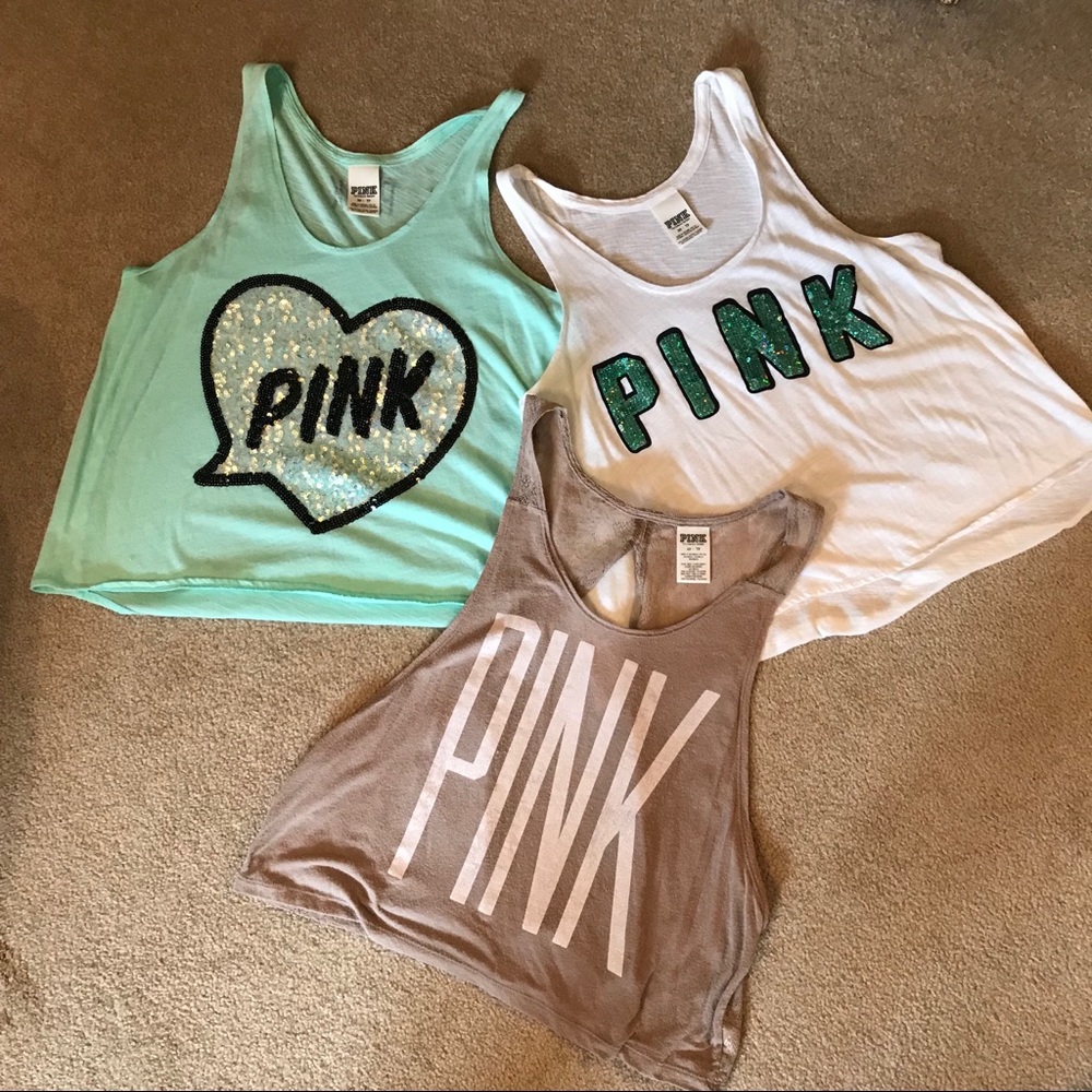 3 PINK tank tops.